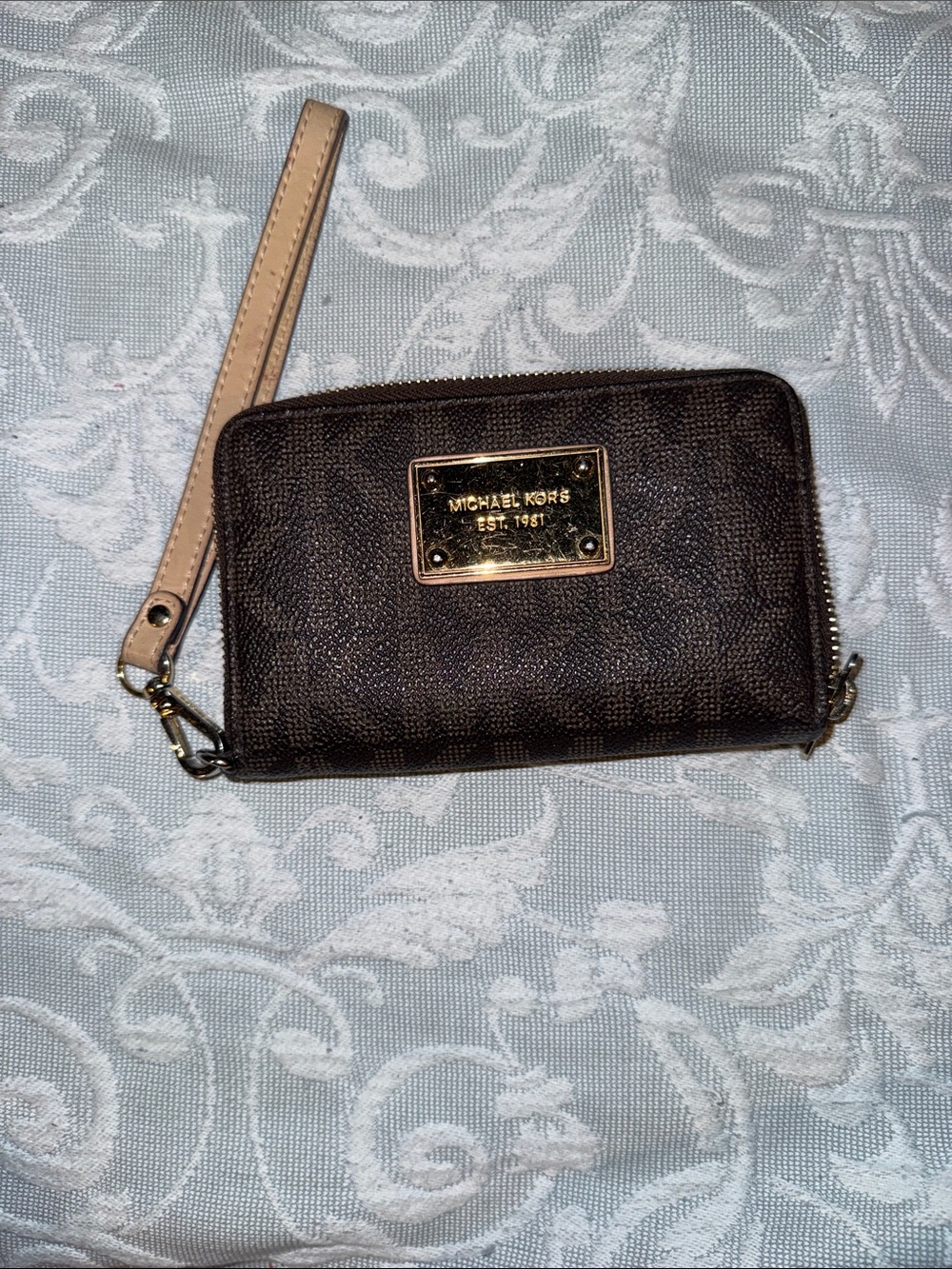 Michael Kors Brown Wristlet with Beige Strap and Gold Plaque